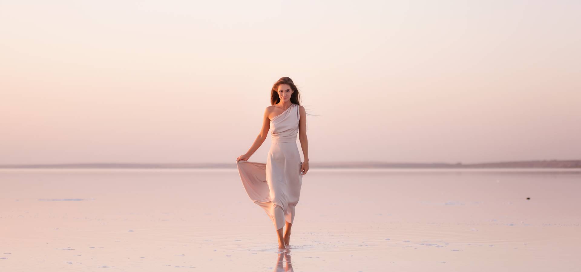 pretty woman walking on water